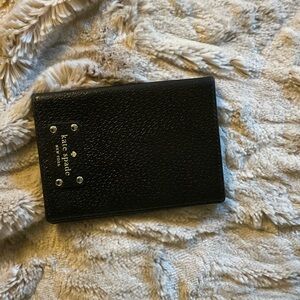 Kate Spade Textured Black Passport Holder.